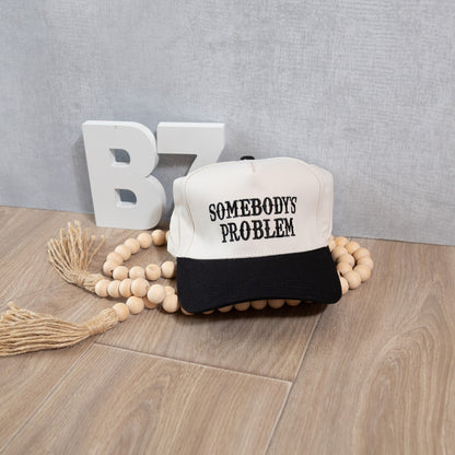 Somebody’s Problem Embroidered Trucker Hat – Bold Statement Western Cap