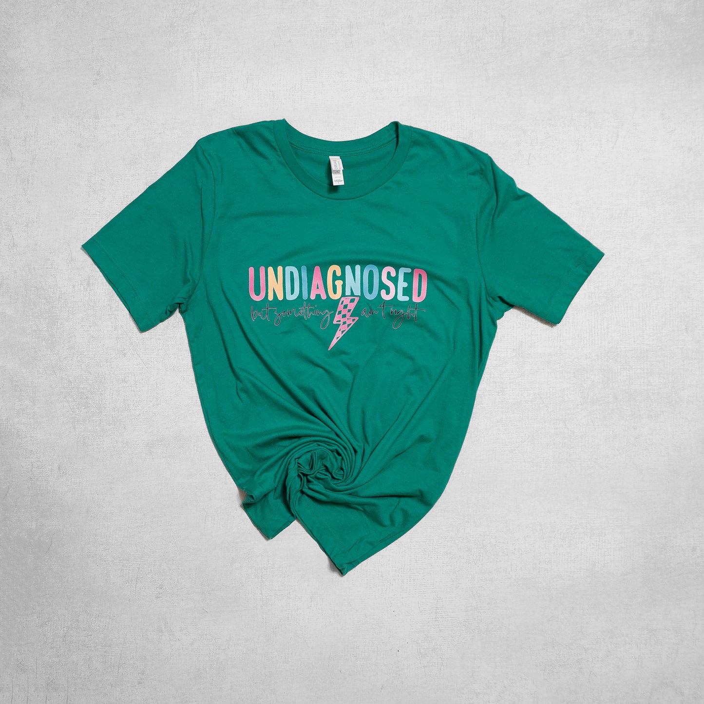 Undiagnosed Lightning Bolt Graphic Tee – Colorful Empowerment T-Shirt