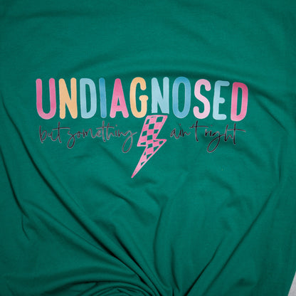 Undiagnosed Lightning Bolt Graphic Tee – Colorful Empowerment T-Shirt