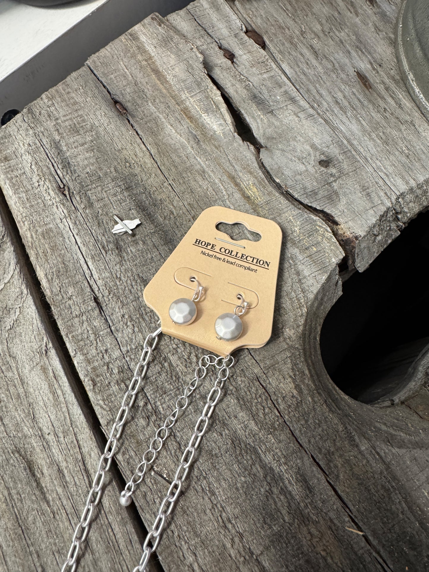 “Layered mixed metal gold and silver necklace”

“Dish Me Up mixed metal layered chain from B7 Boutique”

“Two-tone chain necklace with gold accents and silver links”