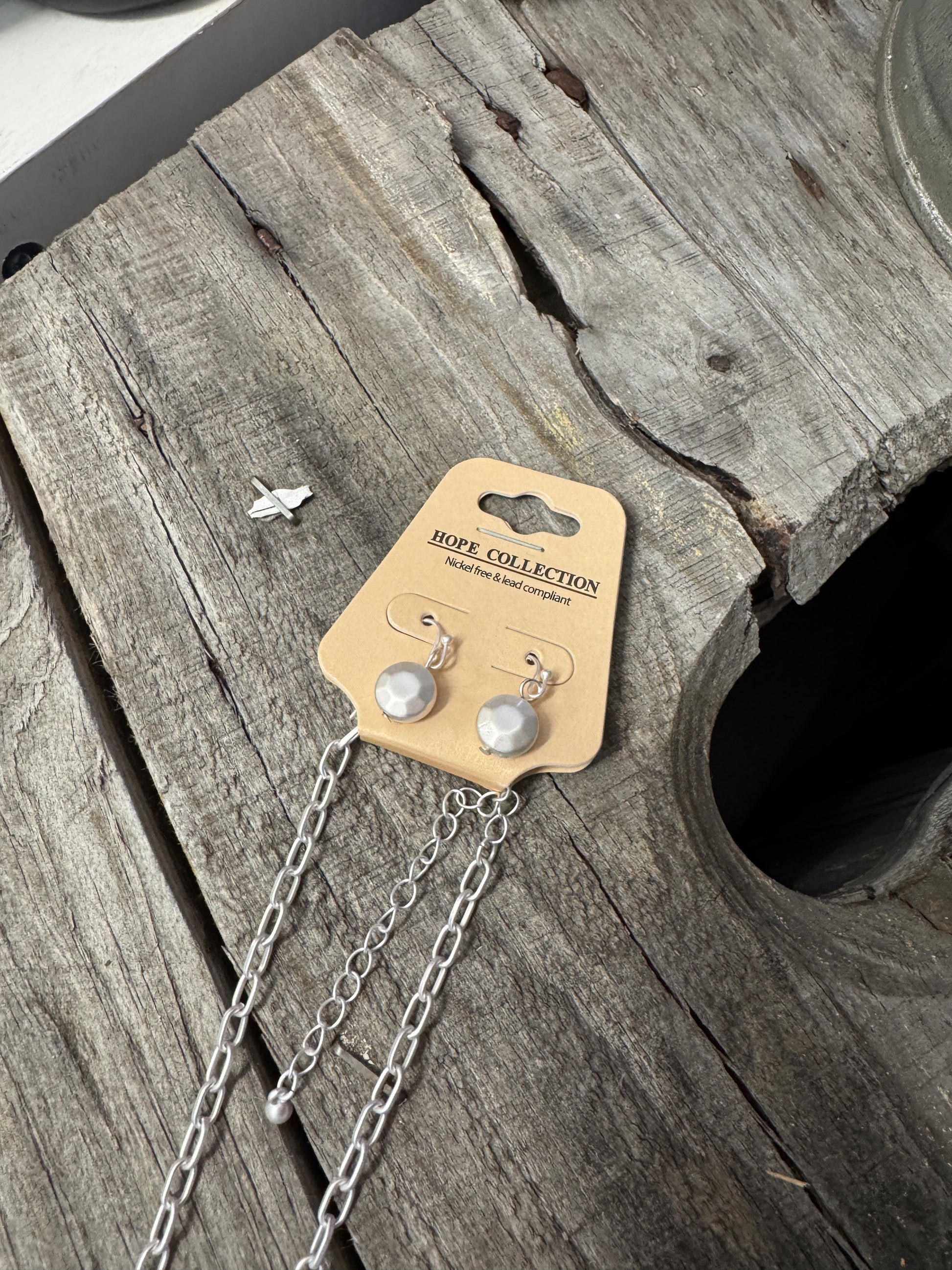 “Layered mixed metal gold and silver necklace”

“Dish Me Up mixed metal layered chain from B7 Boutique”

“Two-tone chain necklace with gold accents and silver links”