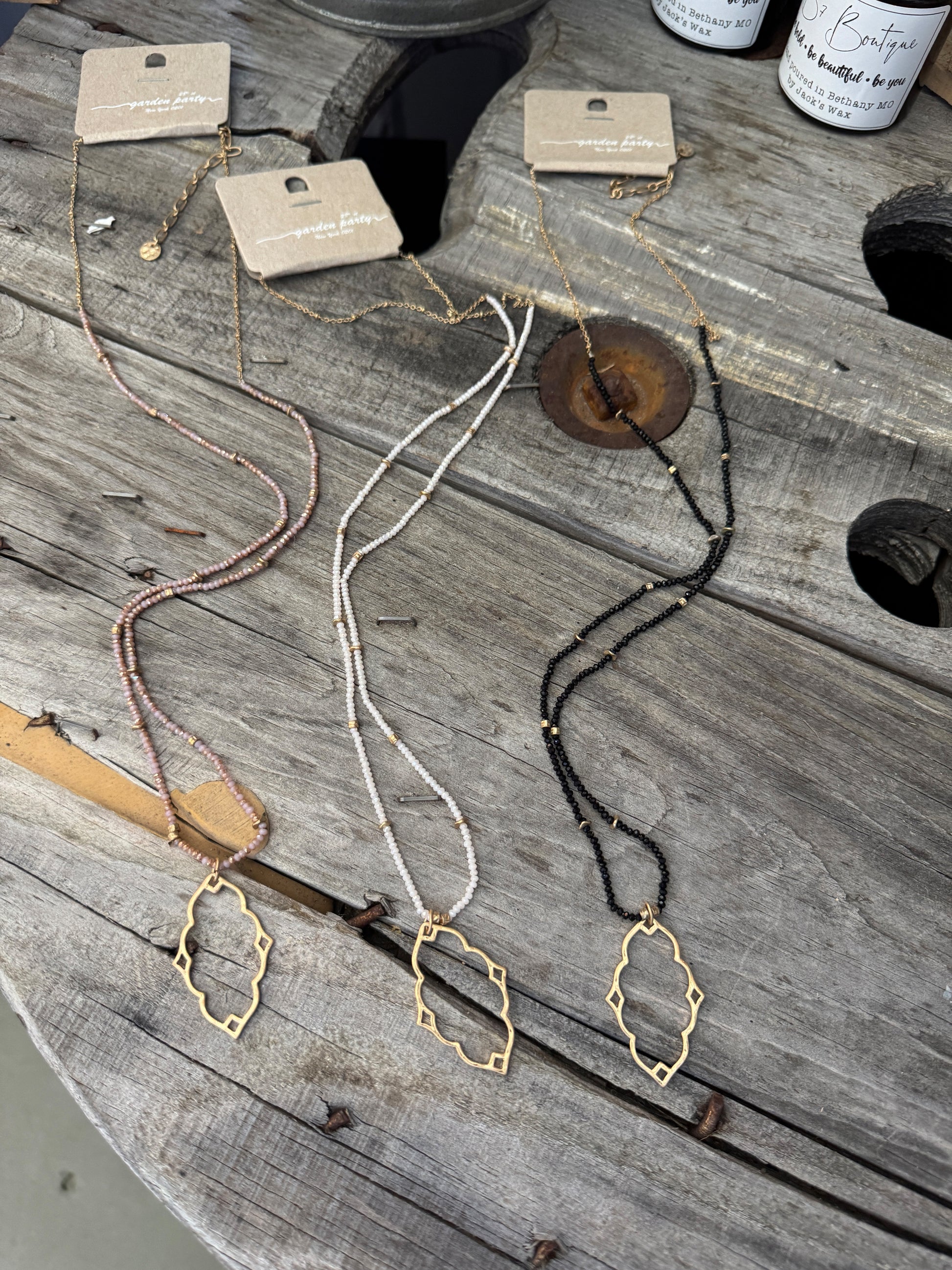 “Dainty Days beaded necklace in pink”

“Elegant black beaded chain necklace from B7 Boutique”

“White subtle beaded necklace, perfect for layering”