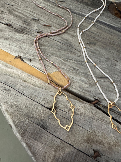 “Dainty Days beaded necklace in pink”

“Elegant black beaded chain necklace from B7 Boutique”

“White subtle beaded necklace, perfect for layering”