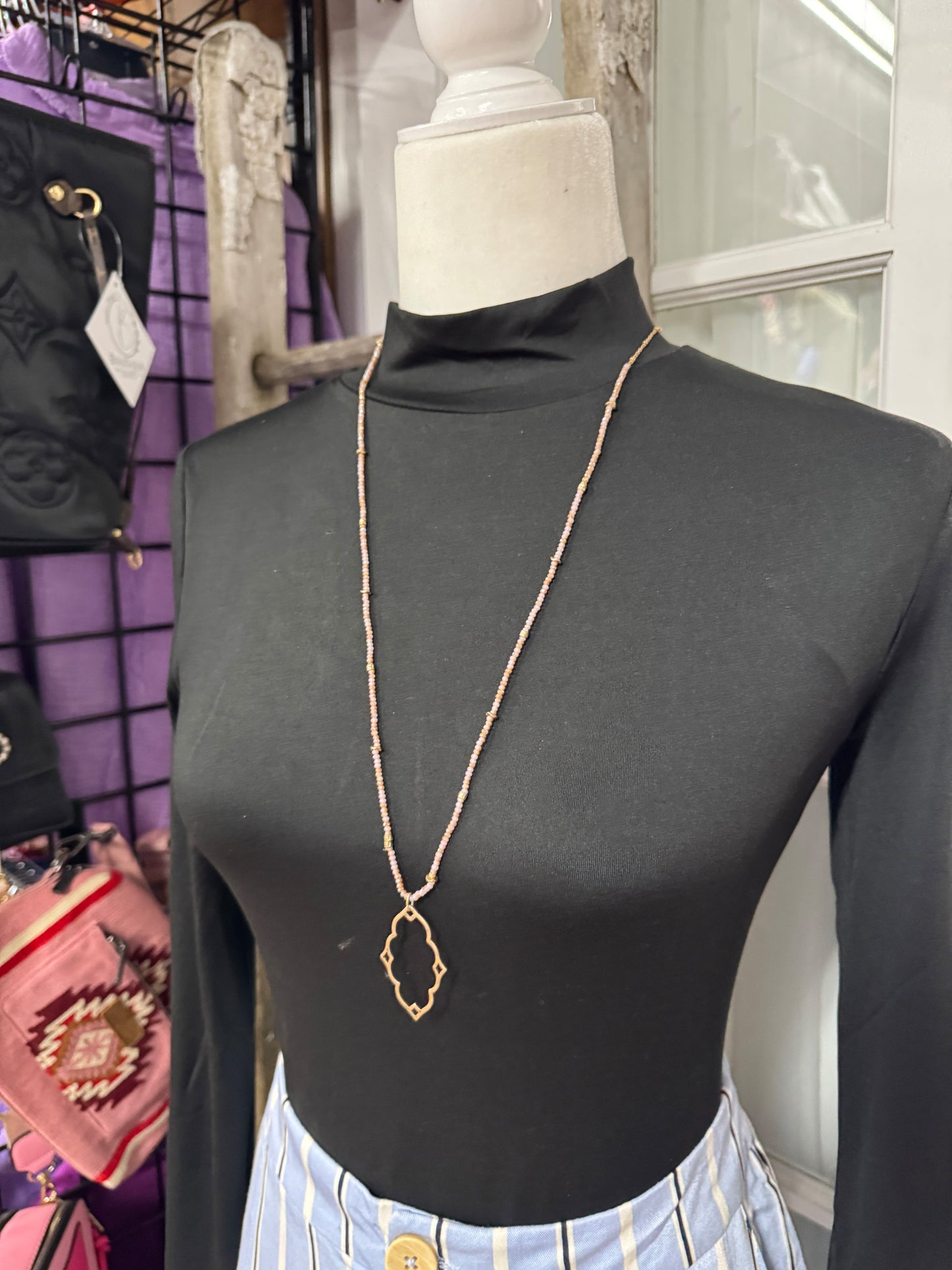 “Dainty Days beaded necklace in pink”

“Elegant black beaded chain necklace from B7 Boutique”

“White subtle beaded necklace, perfect for layering”