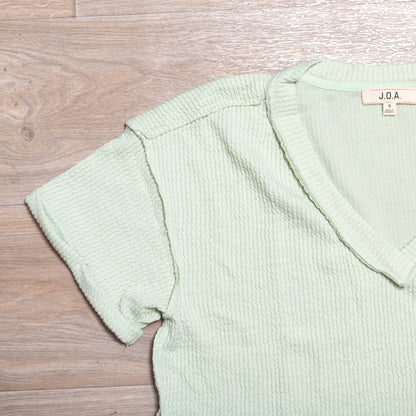 Sage Crush Textured Crop Tee – Soft Knit V Neck Pocket Top