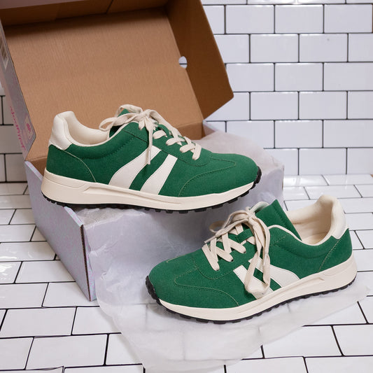“Jellypop Emerie sneakers in Green Tea color block”
“Vegan leather and fabric lace-up sneakers”
“Women’s platform sneakers in green tones”