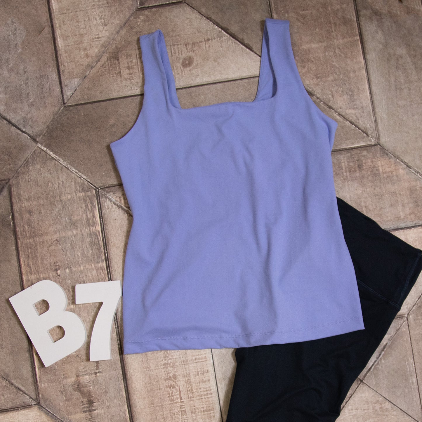 Butter fabric square neckline sleeveless tank in plus size

Buttery-soft tank top with clean square neckline

Plus-size body-fitting tank with stretch and style – B7 Boutique