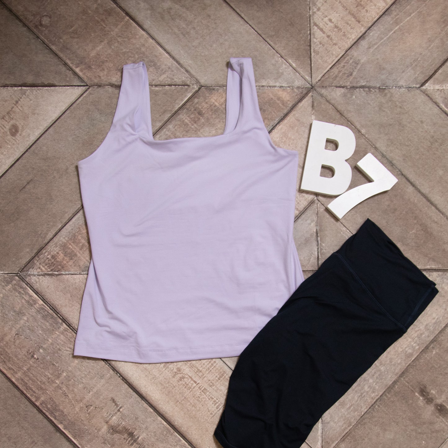 Butter fabric square neckline sleeveless tank in plus size

Buttery-soft tank top with clean square neckline

Plus-size body-fitting tank with stretch and style – B7 Boutique