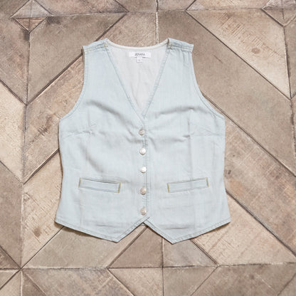 Light blue vest on a tiled floor