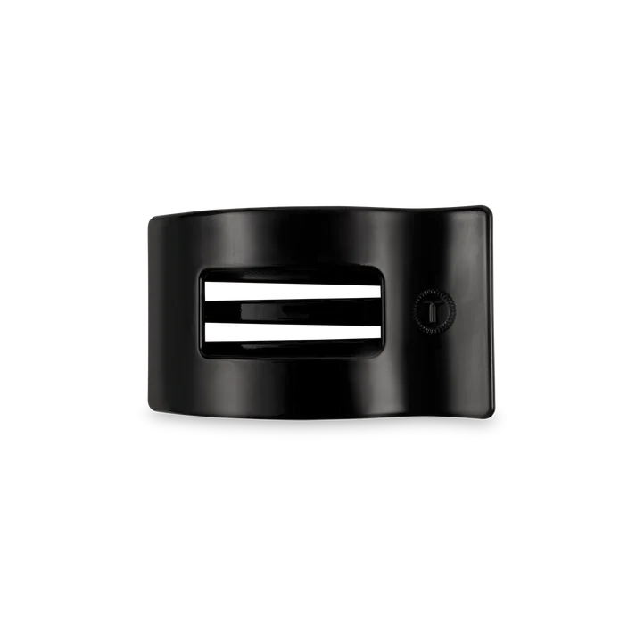 “Small flat TELETIES hair clip on white background”

“No-snag claw clip for thin to medium hair”

“Flat-back TELETIES clip perfect for driving or lounging”