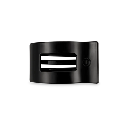 “Small flat TELETIES hair clip on white background”

“No-snag claw clip for thin to medium hair”

“Flat-back TELETIES clip perfect for driving or lounging”