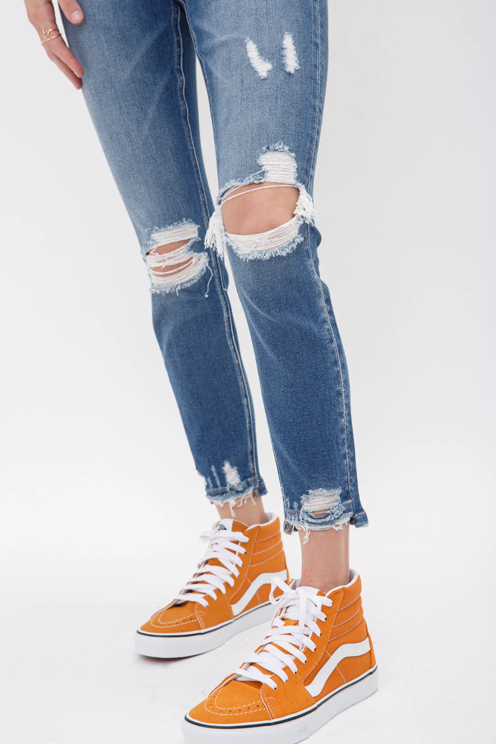 Mica High Rise Crop Skinny Jeans | Distressed Step Hem Denim