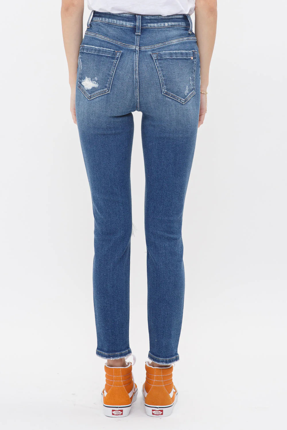 Mica High Rise Crop Skinny Jeans | Distressed Step Hem Denim