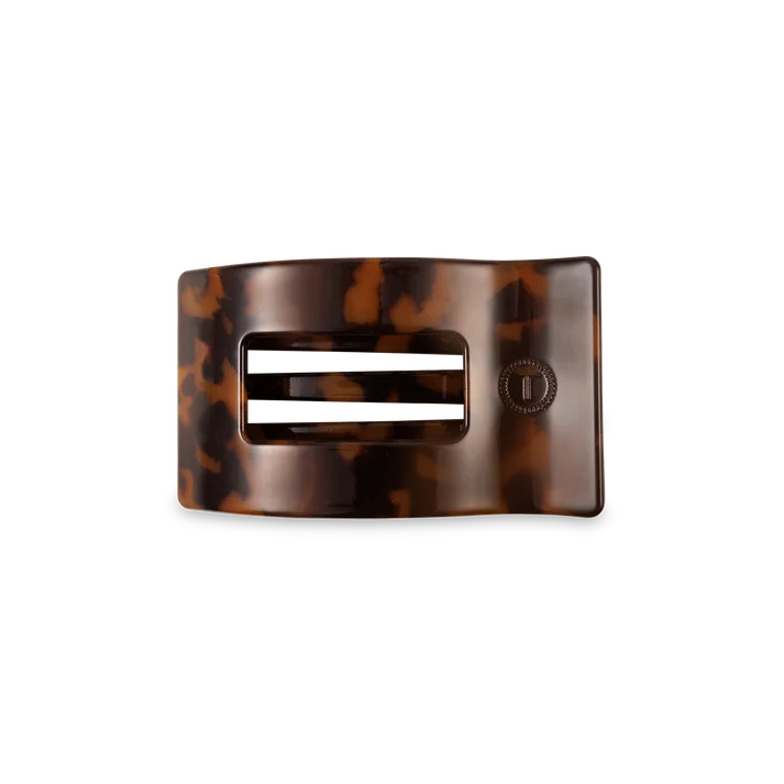 “Small flat TELETIES hair clip on white background”

“No-snag claw clip for thin to medium hair”

“Flat-back TELETIES clip perfect for driving or lounging”