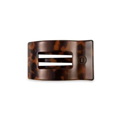 “Small flat TELETIES hair clip on white background”

“No-snag claw clip for thin to medium hair”

“Flat-back TELETIES clip perfect for driving or lounging”