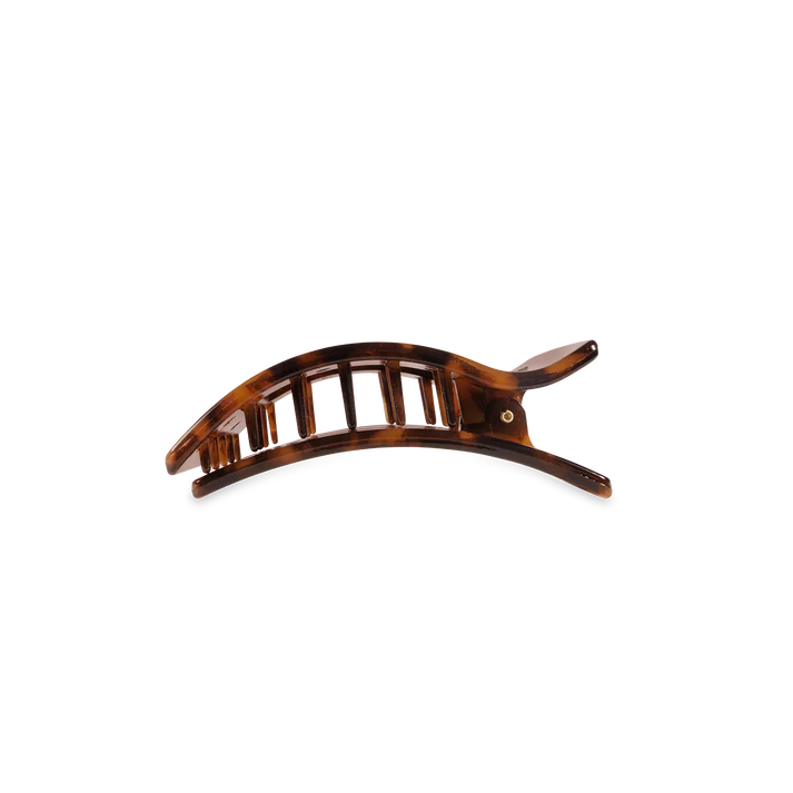 “Small flat TELETIES hair clip on white background”

“No-snag claw clip for thin to medium hair”

“Flat-back TELETIES clip perfect for driving or lounging”