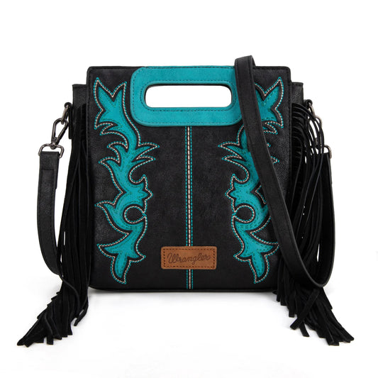 A black leather tote with blue embroidered boot scroll design and fringe detail, featuring a top handle and a detachable crossbody strap.