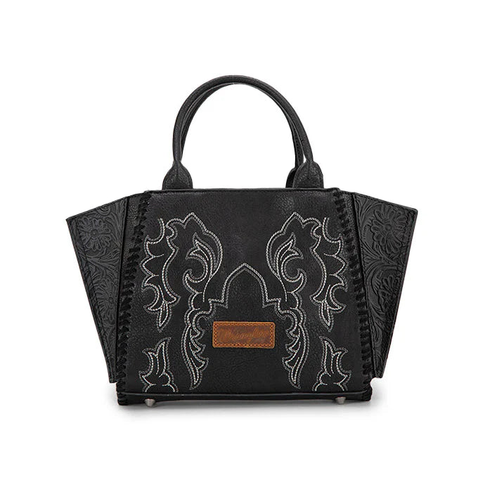 A black trapezoid-shaped tote/crossbody bag with embroidered detailing and a leather logo applique on the front.