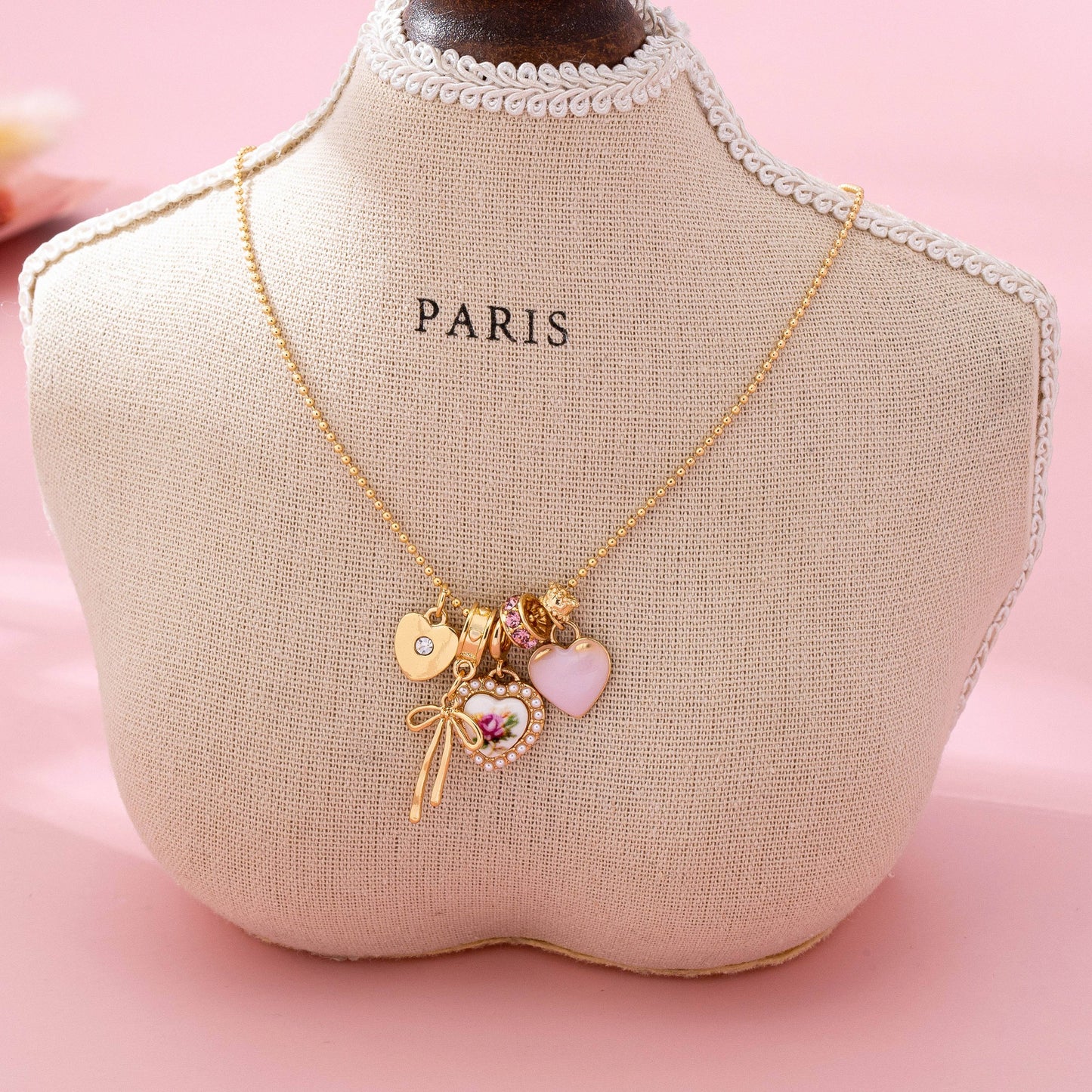 Rose Charm Cluster Necklace | Gold Plated Heart & Bow Necklace
