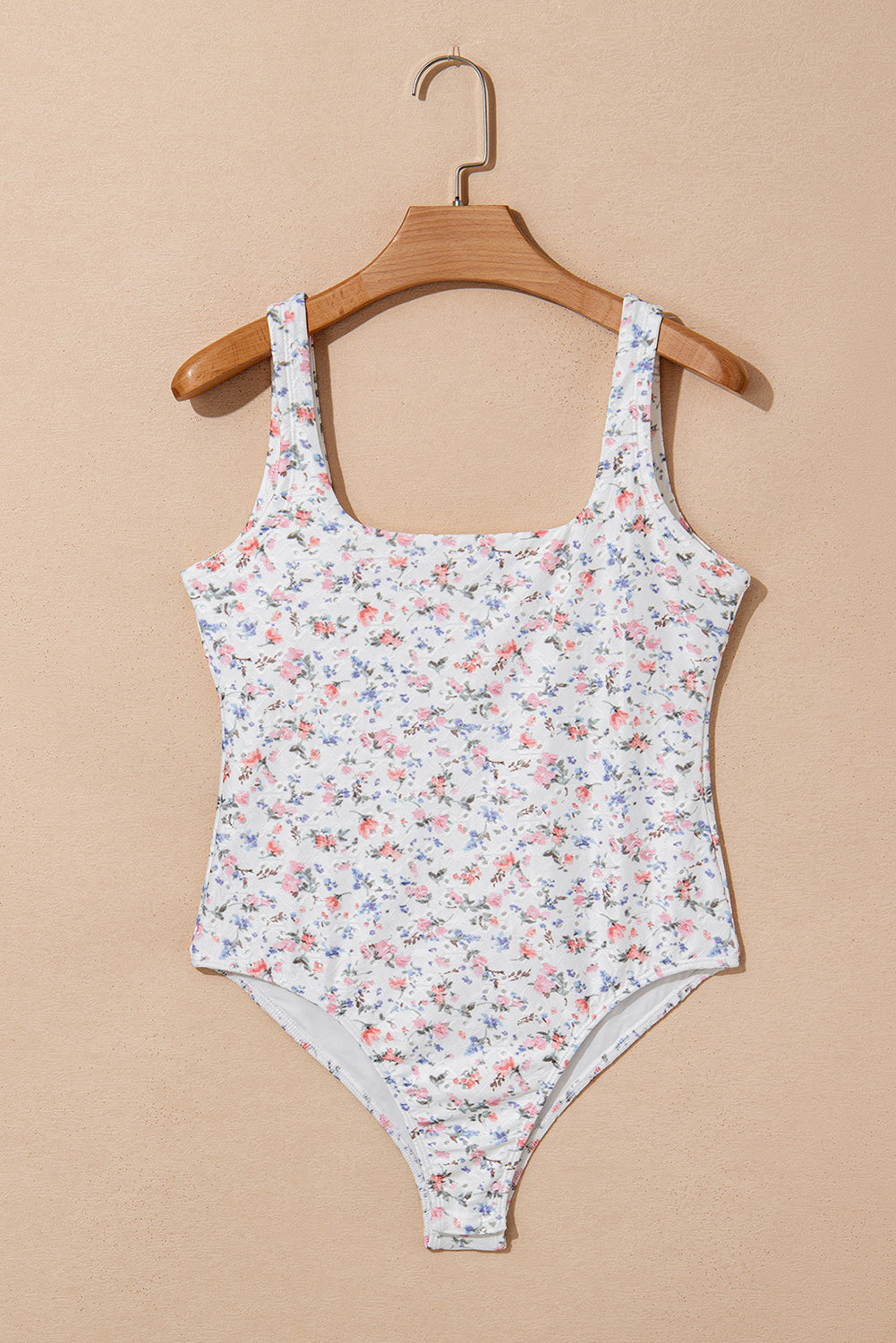 “White floral textured square neck sleeveless bodysuit – B7 Boutique”
“Fitted white bodysuit with floral texture and snap closure”
“Women’s summer bodysuit with square neckline and soft stretch”