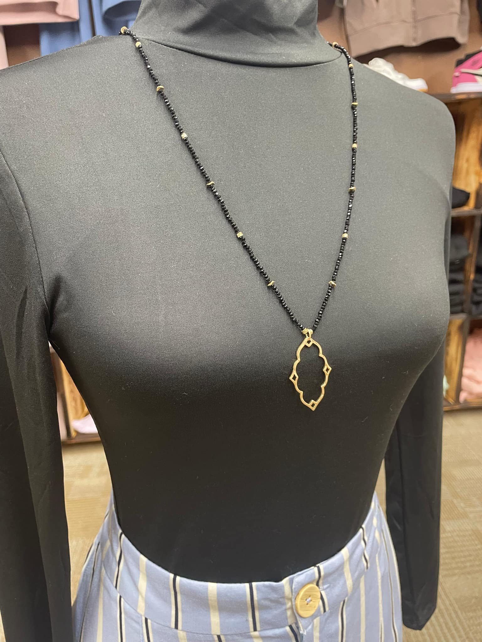 “Dainty Days beaded necklace in pink”

“Elegant black beaded chain necklace from B7 Boutique”

“White subtle beaded necklace, perfect for layering”