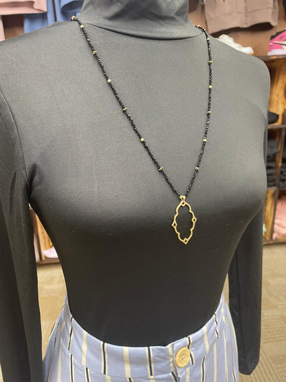 “Dainty Days beaded necklace in pink”

“Elegant black beaded chain necklace from B7 Boutique”

“White subtle beaded necklace, perfect for layering”