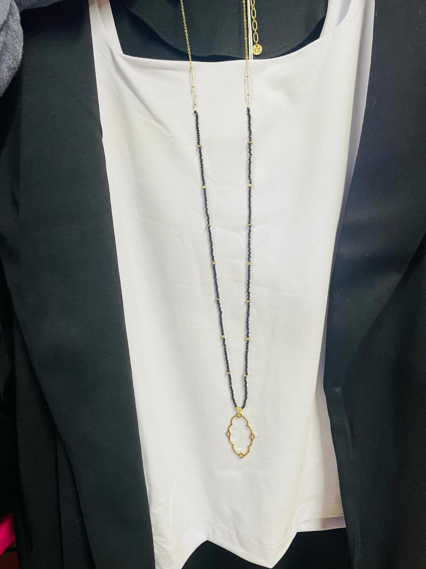 “Dainty Days beaded necklace in pink”

“Elegant black beaded chain necklace from B7 Boutique”

“White subtle beaded necklace, perfect for layering”