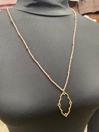 “Dainty Days beaded necklace in pink”

“Elegant black beaded chain necklace from B7 Boutique”

“White subtle beaded necklace, perfect for layering”