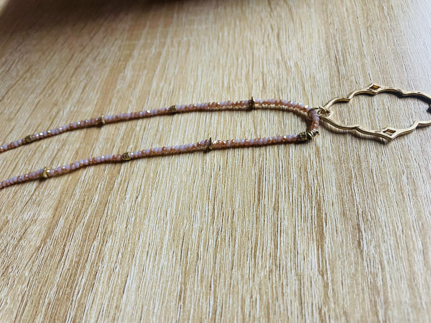 “Dainty Days beaded necklace in pink”

“Elegant black beaded chain necklace from B7 Boutique”

“White subtle beaded necklace, perfect for layering”