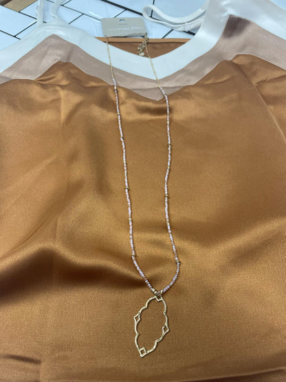 “Dainty Days beaded necklace in pink”

“Elegant black beaded chain necklace from B7 Boutique”

“White subtle beaded necklace, perfect for layering”