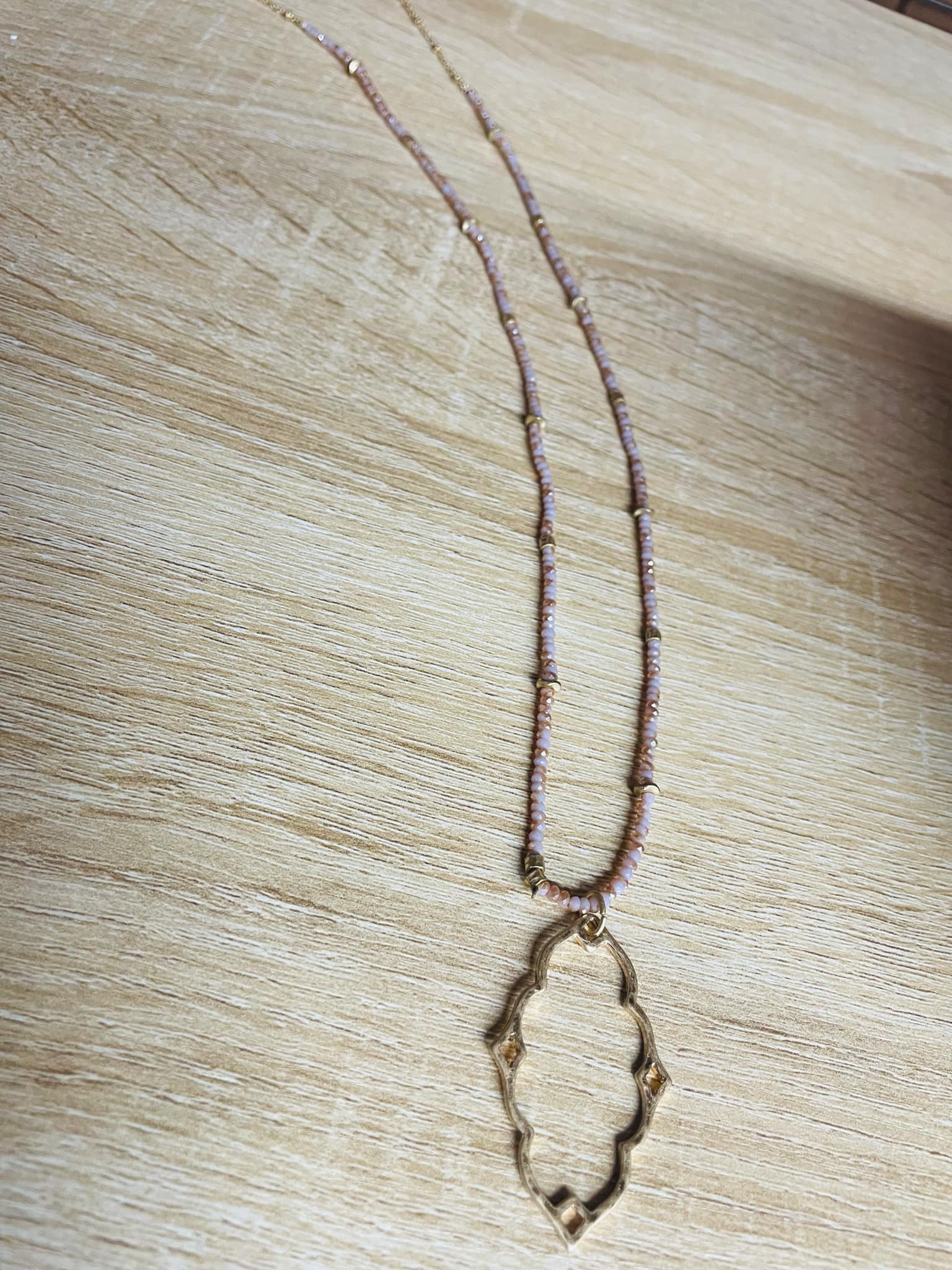 “Dainty Days beaded necklace in pink”

“Elegant black beaded chain necklace from B7 Boutique”

“White subtle beaded necklace, perfect for layering”