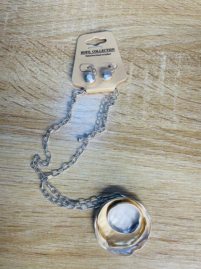 “Layered mixed metal gold and silver necklace”

“Dish Me Up mixed metal layered chain from B7 Boutique”

“Two-tone chain necklace with gold accents and silver links”