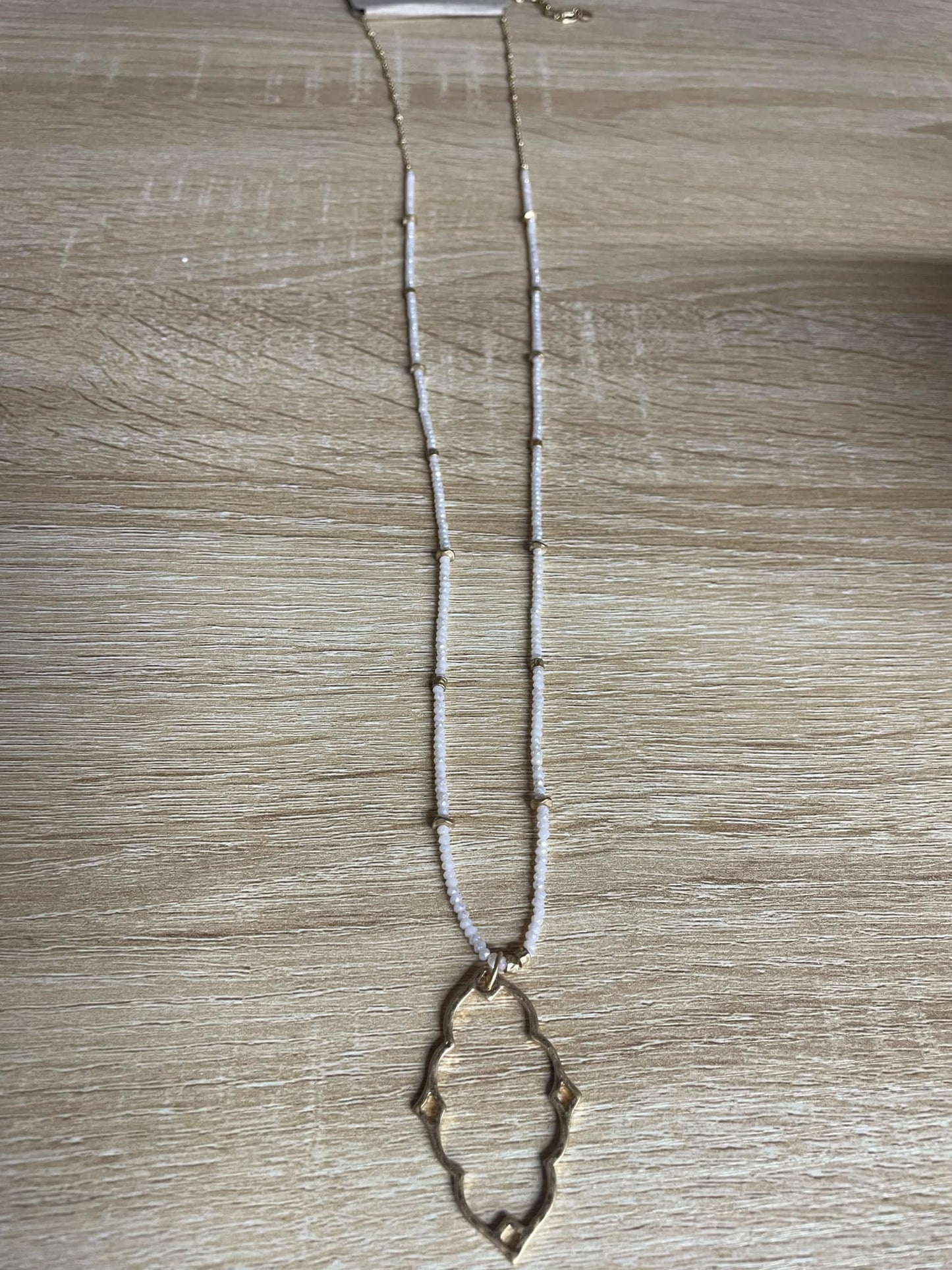 “Dainty Days beaded necklace in pink”

“Elegant black beaded chain necklace from B7 Boutique”

“White subtle beaded necklace, perfect for layering”