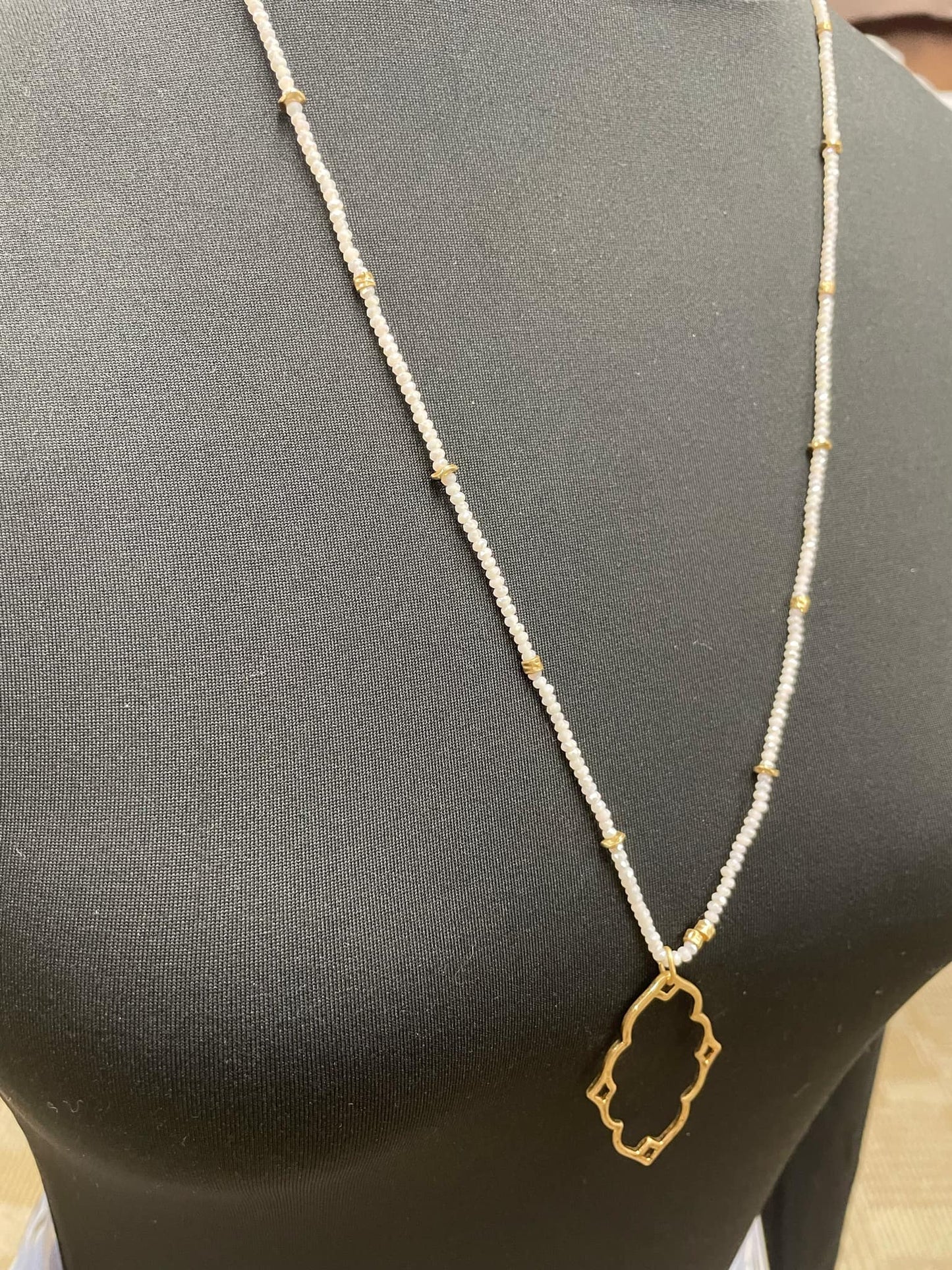 “Dainty Days beaded necklace in pink”

“Elegant black beaded chain necklace from B7 Boutique”

“White subtle beaded necklace, perfect for layering”