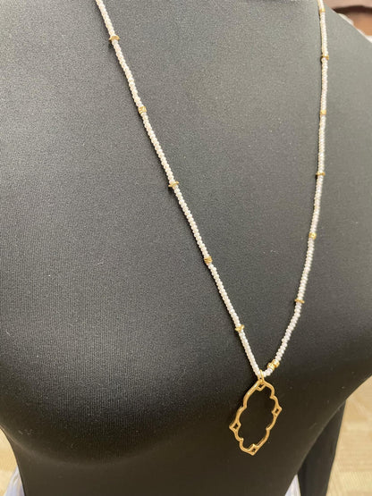“Dainty Days beaded necklace in pink”

“Elegant black beaded chain necklace from B7 Boutique”

“White subtle beaded necklace, perfect for layering”