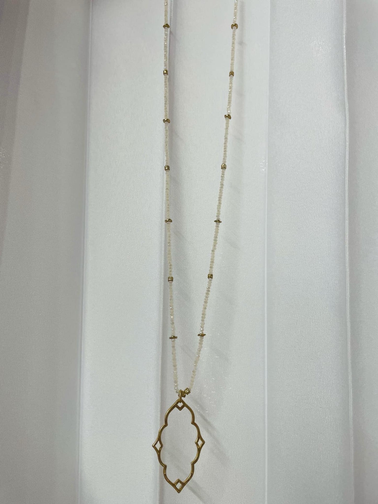 “Dainty Days beaded necklace in pink”

“Elegant black beaded chain necklace from B7 Boutique”

“White subtle beaded necklace, perfect for layering”