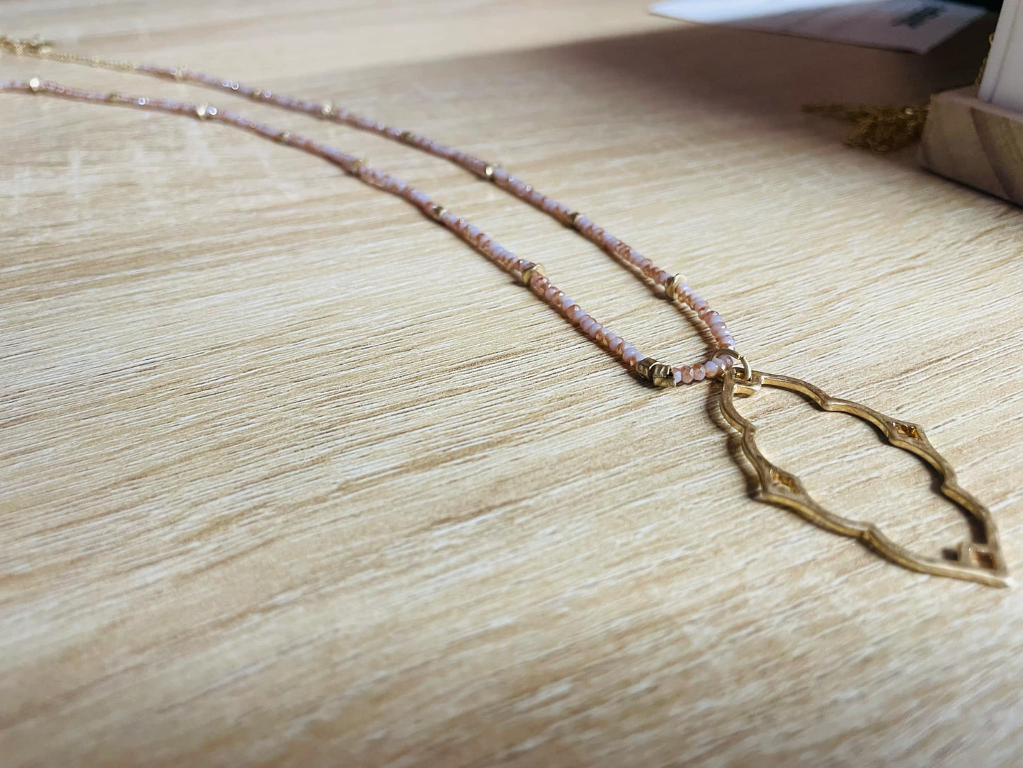 “Dainty Days beaded necklace in pink”

“Elegant black beaded chain necklace from B7 Boutique”

“White subtle beaded necklace, perfect for layering”