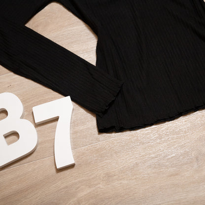 Black ribbed long sleeve henley top with lace neckline and button detail