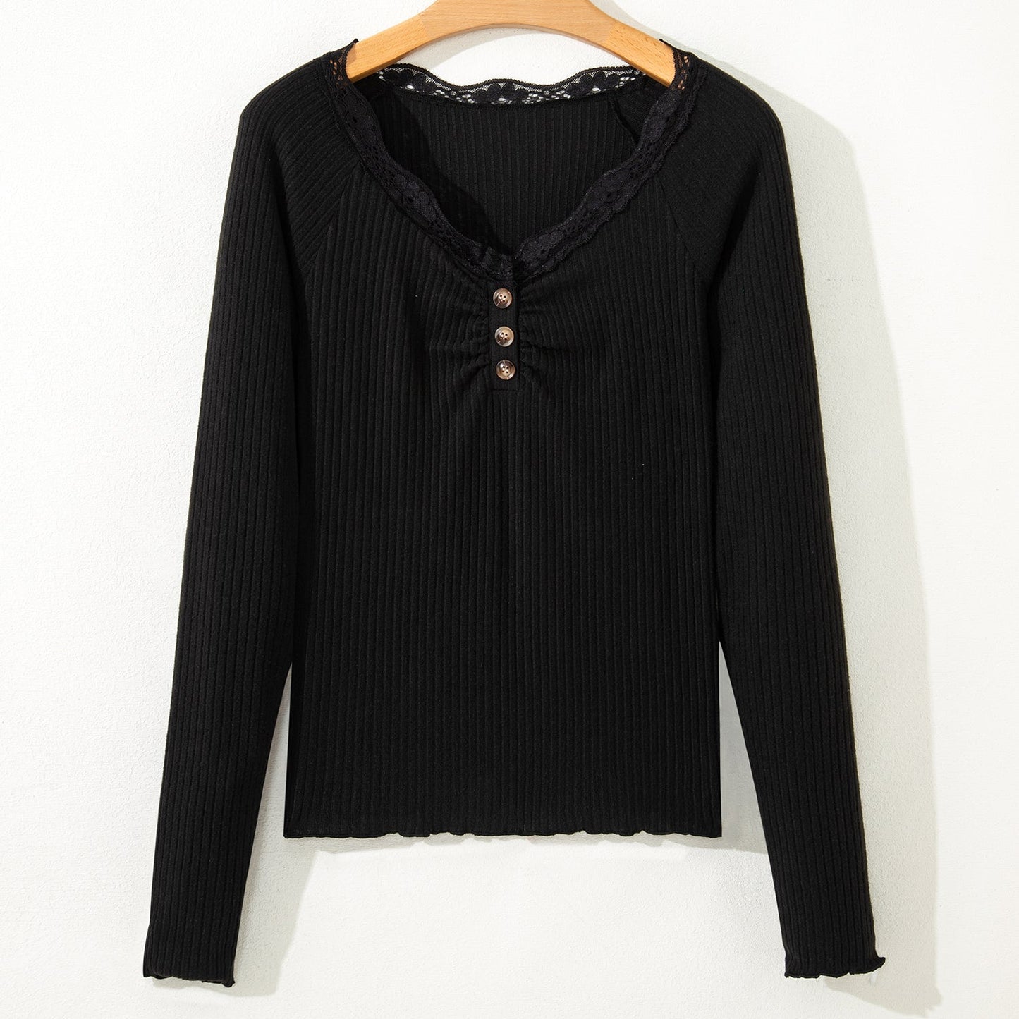 Black ribbed long sleeve henley top with lace neckline and button detail