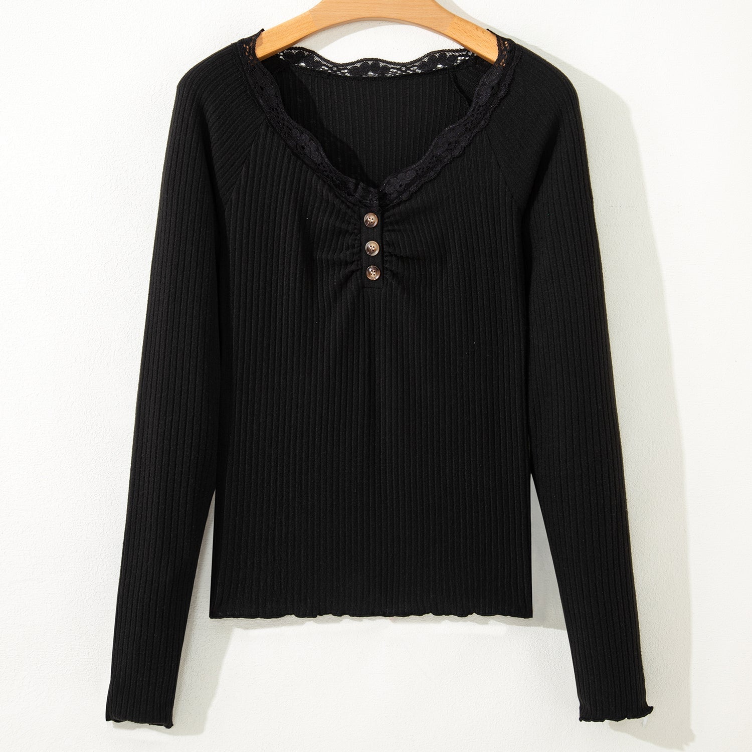 Black ribbed long sleeve henley top with lace neckline and button detail