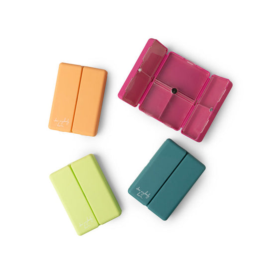 “Everything’s Fine pill and vitamin case with 8 compartments – B7 Boutique”

“Funny travel pill organizer with snap closure”

“Compact supplement case with bold text design”
