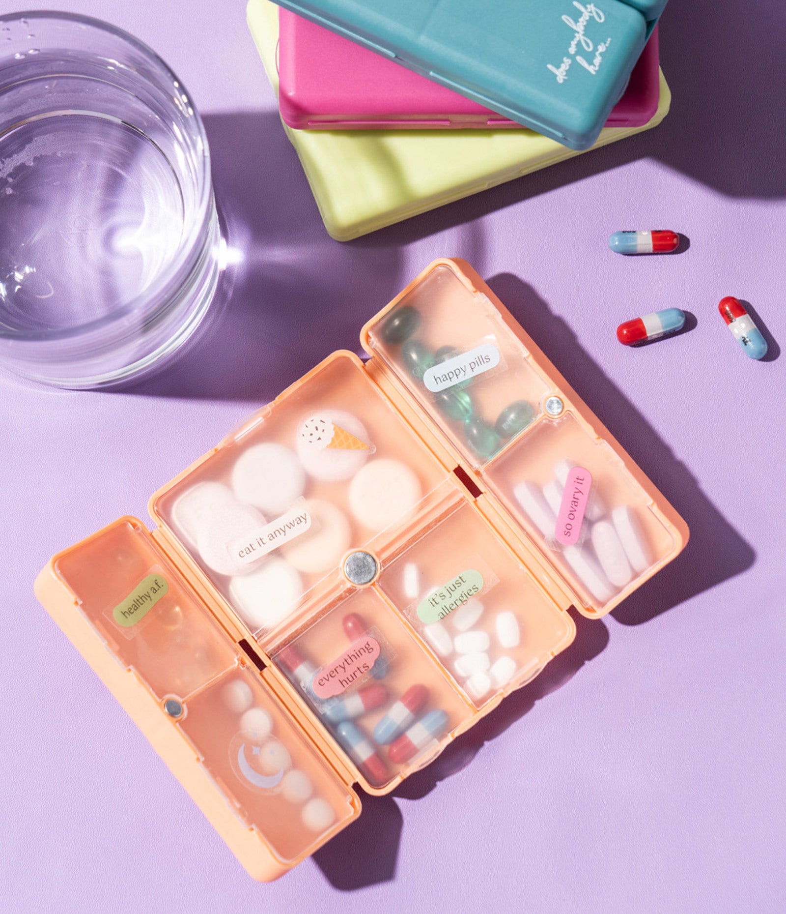 “Everything’s Fine pill and vitamin case with 8 compartments – B7 Boutique”

“Funny travel pill organizer with snap closure”

“Compact supplement case with bold text design”
