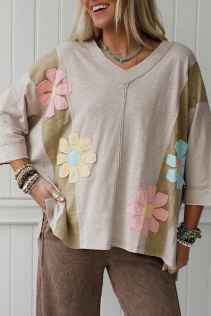 Bloom & Chill Oversized Tee – Green Floral Patch Exposed Seam Relaxed Fit Top