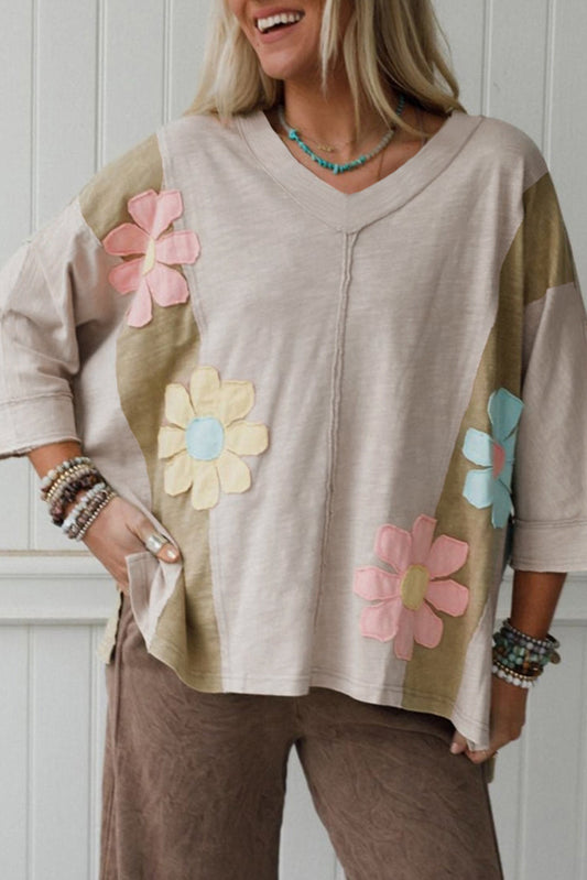 Bloom & Chill Oversized Tee – Green Floral Patch Exposed Seam Relaxed Fit Top