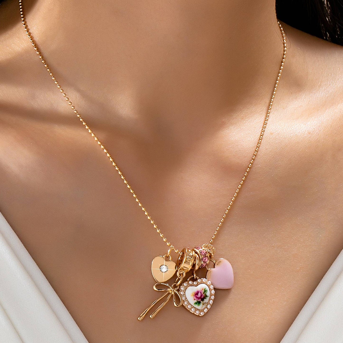 Rose Charm Cluster Necklace | Gold Plated Heart & Bow Necklace