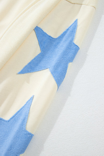 Beige Star Contrast Patchwork Long-Sleeve Top – Relaxed Fit with Exposed Seams