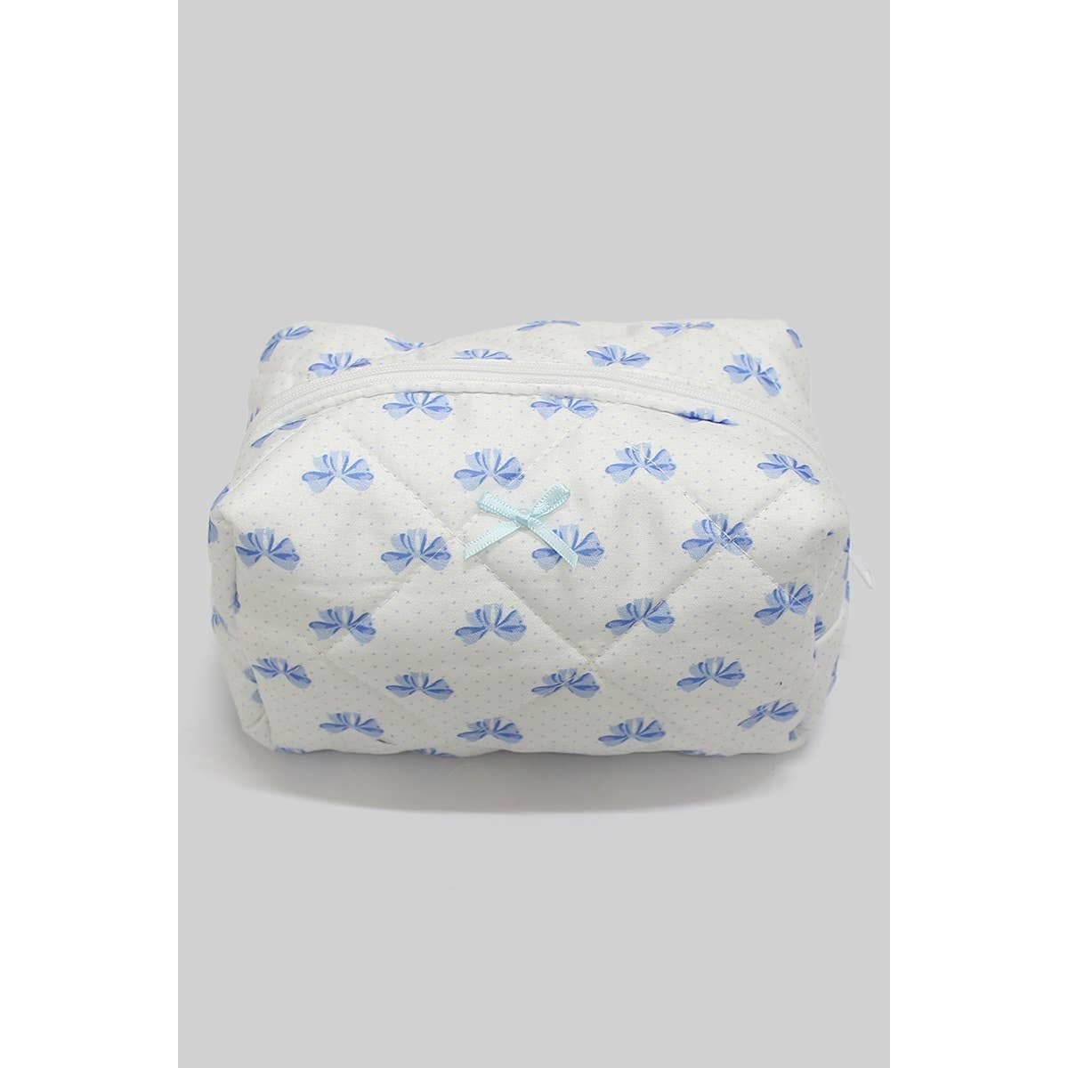 QUILTED MAKEUP BAG WITH BOW PRINT