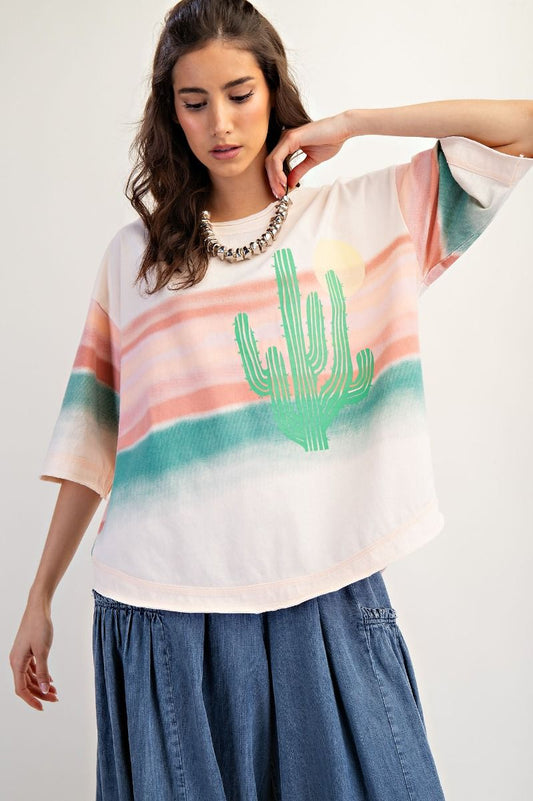 “Sunset Dreams By Easel cactus graphic tee in sunset colors”
“Soft cotton t‑shirt with desert sunset and cactus art”
“Relaxed fit tee with dreamy desert cactus print”