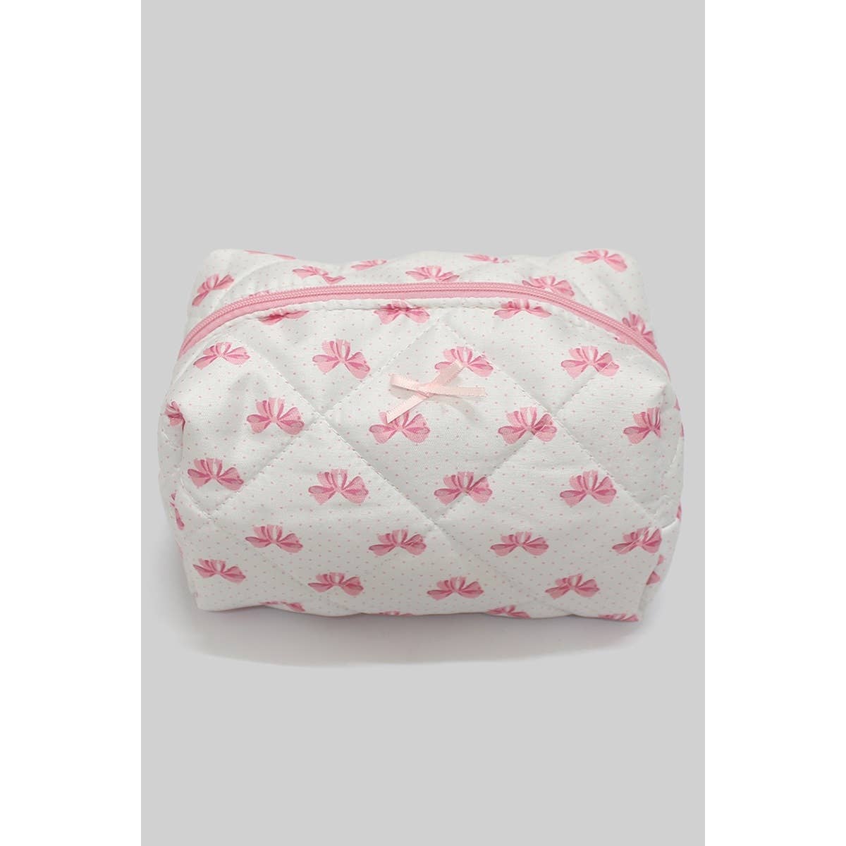 QUILTED MAKEUP BAG WITH BOW PRINT