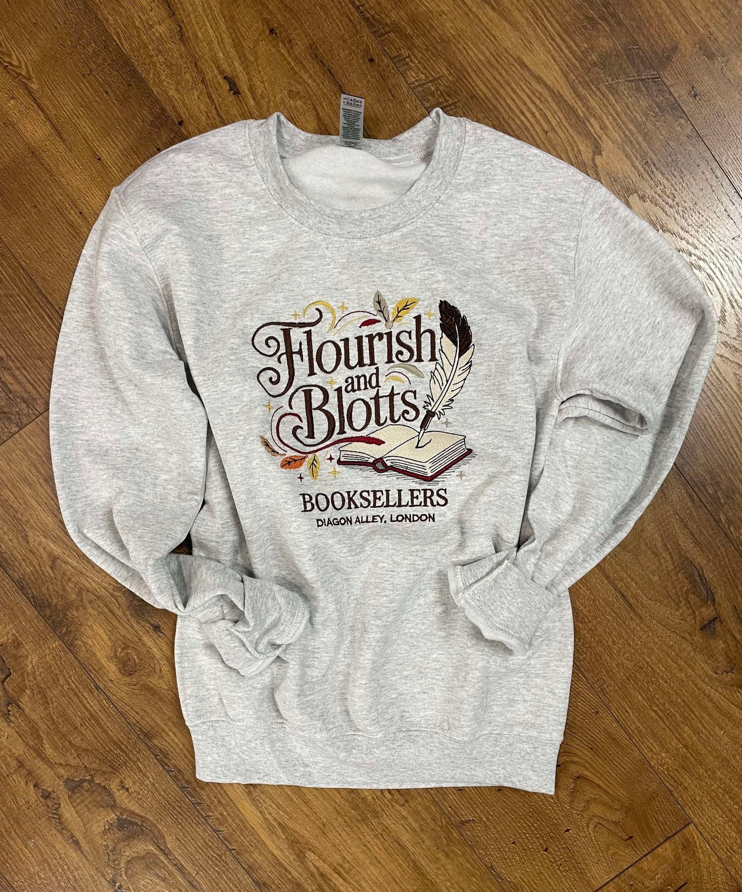 Flourish & Blotts Booksellers Crewneck — Bookish Cozy Sweatshirt